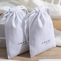 Pochette cadeau personnalisée en sergé 100% coton recyclable, blanche, avec cordon de serrage et logo personnalisé pour l'emballage de jouets
