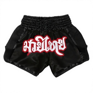 Pantalones Cortos de Muay Thai 2026, Negros, Sólidos, Sin Tejido, para Hombres y Mujeres, Ropa de Artes Marciales, Gimnasio, Lucha en Jaula, Grappling - Product Image 1