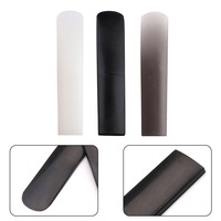 Accessoires pour saxophone en gros, disponibles en trois couleurs. Embouchures de trompette, saxophone ténor