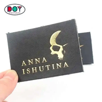 Patches de veste en cuir véritable noir personnalisés avec logo de marque imprimé en aluminium