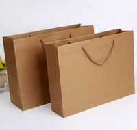 Sacs en papier kraft blanc gaufré de luxe avec poignée en corde de coton et impression numérique de logo personnalisé pour l'emballage alimentaire