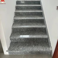 Grande dalle de granit gris poli effet vague de mer, design moderne de luxe, écologique, pour cuisine et salon