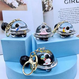 New Acrylic Into Oil Floating Astronaut Black Gold Keychain Pendant Liquid Small Gift Girl <b>Backpack</b> Pendant Accessories - Product Image 1