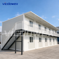 VICDOWEX Maison préfabriquée modulaire en conteneur avec un design contemporain pour usage bureautique et dortoir de travailleurs