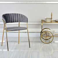 Chaise de salle à manger commerciale moderne dorée en gros de l'usine de Foshan, avec structure en fer et assise en bois, idéale pour restaurant, école et salon
