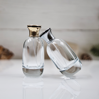Vente en gros de bouteille de parfum plate en verre de 100ml couvercle en alliage de zinc boîte-cadeau personnalisée diffuseur sérigraphie manipulation de surface de gel