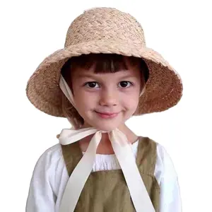 כובע קש רפיה לילדים סרוג ביד רפיה כובעי שמש שטוחים רטרו קיץ נסיעות קרם הגנה חופשה שרוכים כובע קש
