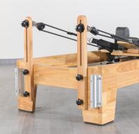 Reformer de Pilates pliable, finition grain de bois, double ressorts et cordes, gain de place, machine d'entraînement corporel complet à faible impact pour la maison