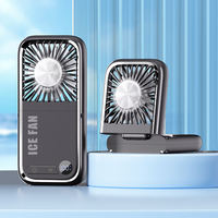 Ventilador de mano multifuncional plegable con refrigeración por semiconductor y enfriamiento por hielo.