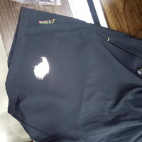 Vinyle thermocollant réfléchissant argenté personnalisable, les décalcomanies thermocollantes réfléchissantes sont utilisées pour l'impression sur les uniformes de travail