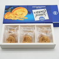 Vente en gros de biscuits sains aux algues chinoises Texture croustillante et goût salé Collations de forme ronde dans un emballage en boîte