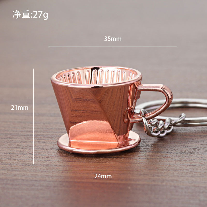 Tasse qui fuit en or rose