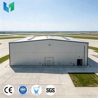 Hangar préfabriqué moderne en structure acier pour avions privés, haute capacité de charge, pour stockage aéronautique de luxe et lieux sportifs