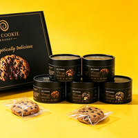 Boîte cylindrique en papier noir personnalisée avec doublure intérieure pour l'emballage de biscuits, mousses, gâteaux et desserts - Vente en gros usine