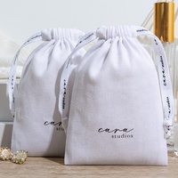 Pochette cadeau personnalisée en sergé 100% coton recyclable, blanche, avec cordon de serrage et logo personnalisé pour l'emballage de jouets