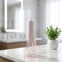 Apiyoo Irrigateur buccal électrique portable sans fil, gratte-langue orthodontique, 4 buses interchangeables, réservoir amovible de 300 ml, 2000 mAh