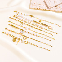 Bracelet élégant de luxe avec breloque croix en acier inoxydable, perles et breloques tendance, vente en gros pour femmes