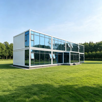 Villa préfabriquée de luxe sur mesure à deux étages, maison modulaire moderne avec mur-rideau en verre et escalier