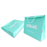 Bolsas de papel de Tarjeta blanca con logotipo personalizado verde reciclado de lujo para embalaje de zapatos