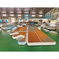 Île de baignade gonflable personnalisée pour l'extérieur Radeau flottant gonflable Jet d'eau flottant pour quai de ski Plate-forme flottante avec échelle