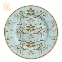 Service de table en céramique bleu turquoise avec motifs floraux dorés, vaisselle en porcelaine fine pour événements et traiteurs