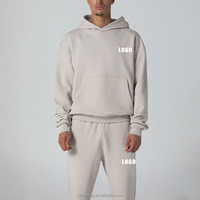 Nouvel ensemble de survêtement pour homme en coton, coupe régulière, 2 pièces, avec logo personnalisé, idéal pour l'hiver, style streetwear, comprenant un sweat à capuche et un pantalon de jogging.