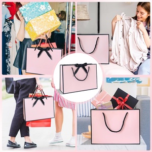 Bolsas de compras de papel para ropa de regalo de lujo personalizadas con impresión de logotipo - Product Image 6