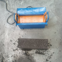 Petite machine manuelle mobile de fabrication de briques de pavage emboîtables, machine à mini-blocs creux en ciment et béton pour la maison et la ferme