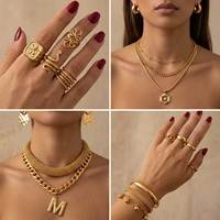 Ensemble de bijoux minimalistes personnalisés, conception de logo OEM ODM, collier, boucles d'oreilles, bagues, bracelet, argent, laiton, acier inoxydable, plaqué or