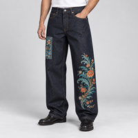 Jeans en denim décontracté pour homme, couleur indigo foncé, avec broderie florale asymétrique