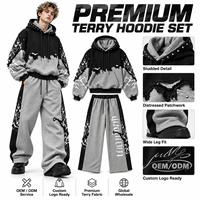 Ensemble sweat à capuche et pantalon de survêtement surdimensionné en molleton bouclette pour homme, avec clous et patchwork, style streetwear vieilli, OEM ODM, faible MOQ