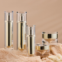 Contenants cosmétiques de luxe personnalisés sans air en acrylique doré de 100 ml, 50 ml, 30 ml pour lotions, ensemble de flacons sans BPA pour perruques