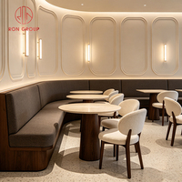 Meubles de restaurant Ron Group, table ronde en marbre, canapé gris foncé, banquette moderne, style luxe léger, café, chaise en tissu bouclé