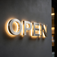 Enseigne lumineuse LED 3D personnalisée de luxe pour entreprise, lettres illuminées en acier inoxydable doré pour l'image de marque murale intérieure