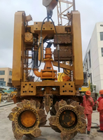 Machine de construction pour fondations profondes, trancheuse à moteur avec boîte de vitesses pour une puissance de creusement élevée et un travail de tranchage efficace