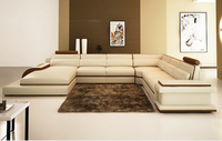 Canapé d'angle moderne et intelligent de style européen pour la maison en cuir véritable avec rembourrage en éponge pour meubles d'appartement