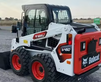 Qualitätsgarantie, Top-Zustand, Standard-Kompaktlader mit kompletter Arbeitsausstattung, Bobcat S450 für den grenzüberschreitenden Exporthandel