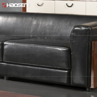Canapé d'angle en cuir HAOSEN S083 avec décoration en grain de bois classique pour bureau