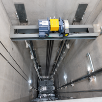 Moteur de traction synchrone à aimant permanent sans engrenages pour ascenseur, faible bruit, système d'ascenseur à économie d'énergie