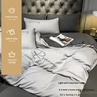 Ensemble de literie printemps-été en fibre lavée imprimée numériquement brodée de couleur unie personnalisable quatre pièces trois pièces Housse de couette