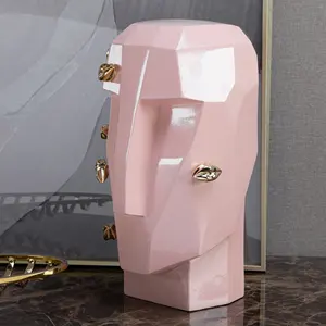 Cabeza humana rosa con labios, diseño artístico, escultura de resina, artículo de decoración