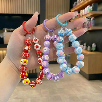 Chaîne de téléphone 2-en-1 personnalisée DIY avec impression UV, motif floral peint à la main, perles acryliques et cristal, dragonne, porte-clés et breloque de sac pour filles