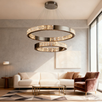 Lustre suspendu de luxe en acier inoxydable doré avec cristaux LED, hauteur réglable, idéal pour salon moderne et décoration intérieure