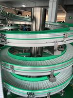 Trasportatore a Spirale Flessibile per Sollevamento Verticale di Bottiglie