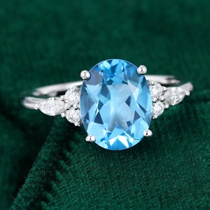 แหวนเงินแท้ 925 งานฝีมือประณีต แหวนทรงรีประดับพลอยบลูโทแพซและเพชร CZ สำหรับสุภาพสตรี - Product Image 1