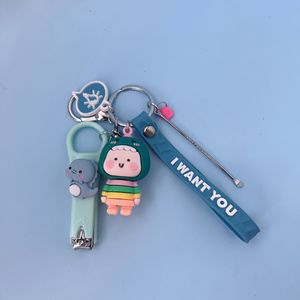 Llavero de Dinosaurio de Dibujos Animados con Limpiador de Oídos y Cortaúñas, Bonito Colgante de Muñeco para Bolsa, Llavero Universal para Niños - Product Image 2