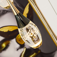 Lustre en cristal doré en acier inoxydable pour villa, escalier intérieur avec design en spirale et utilisation sécurisée, luminaire suspendu moderne pour escaliers