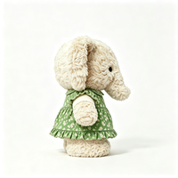 Vente en gros d'éléphant en peluche doux et bouclé, vêtu d'une robe verte à fleurs, design personnalisé, mascotte, cadeau, jouet en peluche