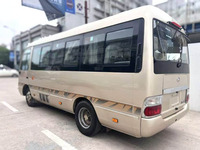 Bus d'occasion 2021 Chine Coaster Économique Moteur ISUZU 19 places Transmission Manuelle Conduite à Gauche Norme d'Émission JMC 91-110 Km/h