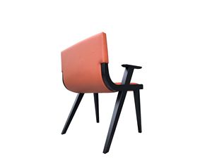 Chaise de salle à manger rembourrée de style moderne du milieu du siècle, avec pieds en bois noir et dossier en cuir orange - Product Image 1